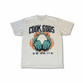 Cook Gods graphic t-shirt with teal headphones on fire and gothic logo. Cream cotton.